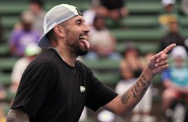 Nick Kyrgios entertains fans at the Kooyong Classic in Melbourne