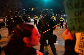 President Donald Trump has threatened to invoke an emergency law allowing soldiers to act as police in response to protests in Minneapolis, where federal agents have shot two people