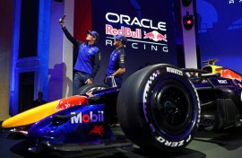 Red Bull drivers Isack Hadjar and Max Verstappen snap a selfie at te unveiling of the team's car for the 2026 Formula One season