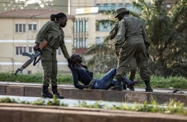 Uganda voted under heavy security presence