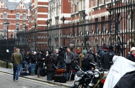 The media waits outside the High Court in London on the first day of Harry's case against a top UK newspaper publisher