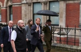 Prince Harry leaves court after telling court tabloids made wife's life 'absolute misery'