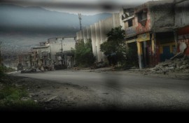 A deserted street in Port-au-Prince as seen from a police patrol vehicle