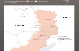 Firefighters from the State Emergency Services of Ukraine tackle blazes in Kyiv after the Ukrainian capital was attacked by Russian missiles and drones overnight