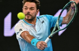 Stan Wawrinka hits a shot against Taylor Fritz