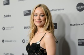 Olivia Wilde wore an 'ICE Out' badge when she attended the premiere of her new movie 'The Invite' at the Sundance Film Festival