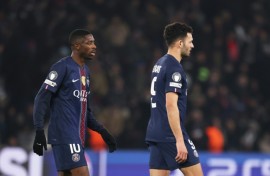 Paris Saint-Germain's Ousmane Dembele (L) and Goncalo Ramos pictured at the end of Wednesday's 1-1 draw with Newcastle United which condemned both teams to have to enter the knockout phase play-offs in this season's Champions League