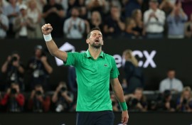 Serbia's Novak Djokovic celebrates victory over Italy's Jannik Sinner