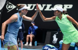 Belgium's Elise Mertens (L) and partner China's Zhang Shuai won the Australian Open women's double title