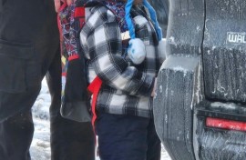 This photo obtained from Columbia Heights Public Schools shows five-year-old Liam Conejo Ramos as he is being detained by immigration officers on January 20, 2026 in Minneapolis, Minnesota