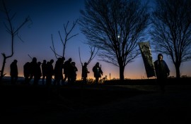 The few dozen men, most in their sixties, were headed to Nagano's Lake Suwa in search of a phenomenon called "God's Crossing"
