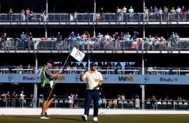 American Chris Gotterup acknowledges the crowd on the 16th green on the way to the first-round lead in the US PGA Tour Phoenix Open