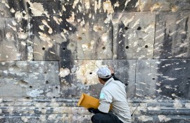Cambodian officials say heavy artillery shelling and aerial bombardment carried out by the Thai army caused damage to the Preah Vihear temple