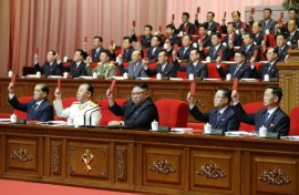 During the last ruling party congress in North Korea, Kim Jong Un (C) was named general secretary, resurrecting a title previously held by his late father