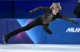 Ilia Malinin takes off in the routine that earned the USA figure skating team gold at the Milan-Cortina Winter Olympics