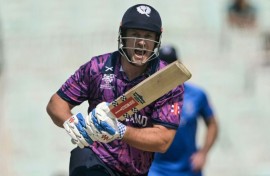 Scotland's George Munsey reacts after playing a shot