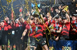 Crusaders' David Havili (C) and teammates celebrate their 2025 Super Rugby title