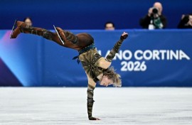 Ilia Malinin wows the crowd with an acrobatic one-handed cartwheel at the Milano-Cortina Winter Olympics