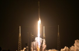 A SpaceX Falcon 9 rocket with the company's Dragon spacecraft on top launches from Cape Canaveral, en route to the International Space Station