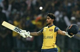 Sri Lanka's Pathum Nissanka celebrates after scoring 100 against Australia