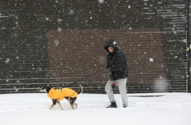 Authorities in New York, New Jersey and Rhode Island issued travel restrictions and shut schools