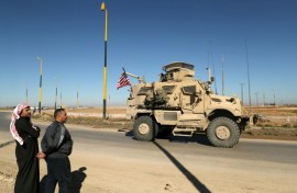 A US military vehicle in northeastern Syria driving towards the Iraqi border