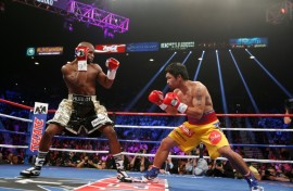 Floyd Mayweather (left) beat Manny Pacquiao in their 2015 'Fight of the Century' in Las Vegas