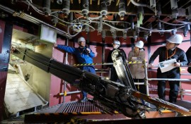 The snake-like robot arm measures 22 metres and weighs about 4.6 tonnes