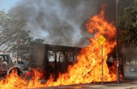 CJNG gang members blocked roads with burning vehicles after the killing of their leader