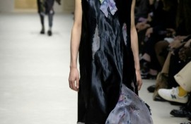 Distressed or "eaten away" fabrics were prevalent at Prada during Milan Fashion Week.