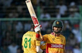 Zimbabwe's captain Sikandar Raza celebrates after scoring fifty against South Africa