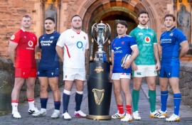 Wales' Dewi Lake, Scotland's Sione Tuipulotu, England's Jamie George, France's Antoine Dupont, Ireland's Caelan Doris, and Italy's Michele Lamaro pose with the trophy in January before the accident