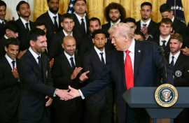 US President Donald Trump shakes hands with Inter Miami's Argentinian star Lionel Messi at an event honoring the club's 2025 MLS Cup title