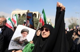 People hold portraits of Iran's slain supreme leader Ayatollah Ali Khamenei as they take part during an anti US-Israel demonstration after Friday prayer in Tehran on March 6