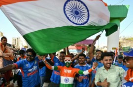 Cricket fans cheer as they arrive to watch the 2026 ICC Men's T20 Cricket World Cup final match
