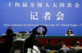 China's Foreign Minister Wang Yi, who is also a member of the Political Bureau of the Communist Party of China Central Committee, attends a press conference in Beijing