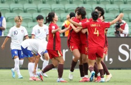 China players celebrate a goal by Shao Ziqin during the AFC Women's Asian Cup quarter-final against Taiwan