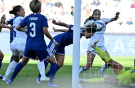 Mina Tanaka (C) scored Japan's opening goal in theirWomen's Asian Cup quarter-final with the Philippines