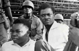 Patrice Lumumba (R) and Senate vice-president Joseph Okito (L) after their arrest in Leopoldville (now Kinshasa) in 1960