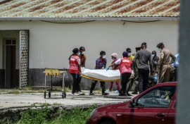 Some of the migrants dropped offshore did not know how to swim, a rescuer said