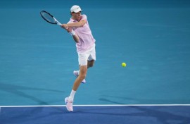 Jannik Sinner blasts a backhand against Corentin Moutet in his victory at the Miami Open
