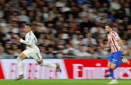 French great Kylian Mbappe (L) says he felt anger and anxiety over a knee injury that is now behind him