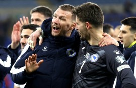 Edin Dzeko (L) leads the line for Bosnia and Hercegovina