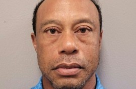 This handout booking photo shows golf superstar Tiger Woods after his arrest on suspicion of driving under the influence after a car crash in Florida