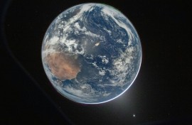 This NASA handout picture taken by Artemis 2 commander Reid Wiseman shows Earth as seen from the Orion spacecraft as it travels toward the Moon