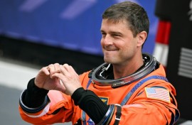 NASA astronaut Reid Wiseman gestured a heart sign before the Artemis II took off to orbit the Moon, where astronauts proposed for a crater to be named "Carroll" in honor of his deceased wife