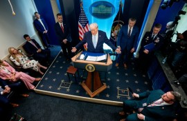 US President Donald Trump -- accompanied by CIA Director John Ratcliffe (C-L), Secretary of Defense Pete Hegseth (2nd-R) and Chairman of the Joint Chiefs of Staff General Dan Caine (R) -- speaks during a news conference at the White House on April 06, 2026