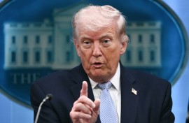 President Donald Trump and US Secretary of War Pete Hegseth arrive for a news conference