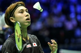 Japan's Kodai Naraoka tosses up a shuttlecock at the badminton world championships in Paris on August 28