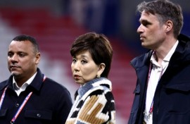 Lyon's technical director Matthieu Louis-Jean (L), US businesswoman and club president Michele Kang (C) and the French club's general manager Michael Gerlinger (R) at a Ligue 1 match against Paris FC on March 8, 2026